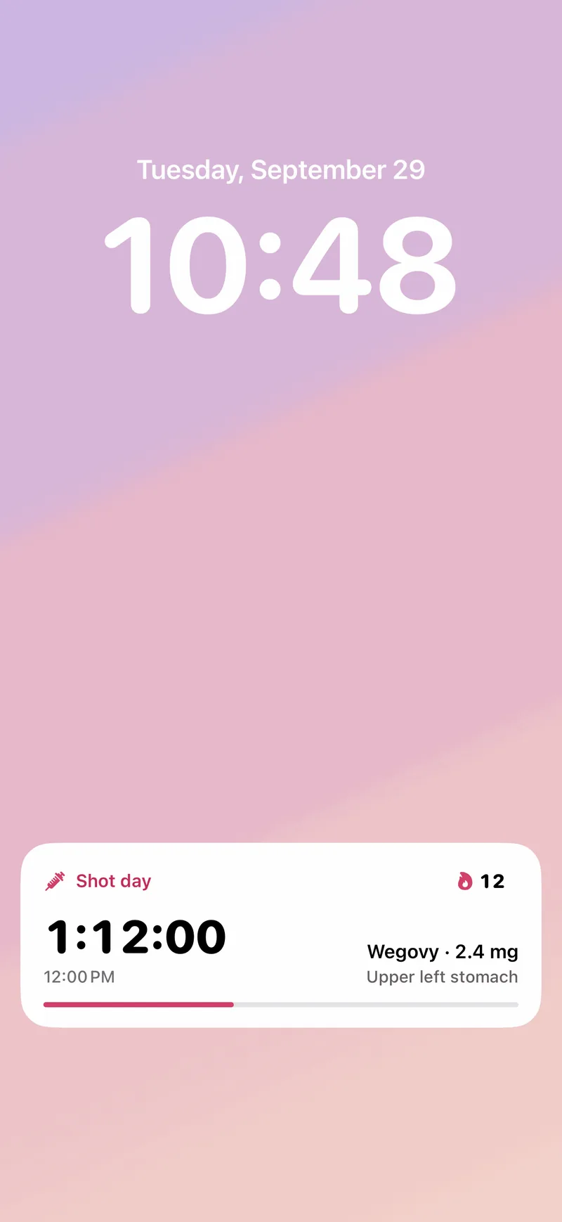 The Lock Screen with the Her Pep Live Activity counting down to today's shot